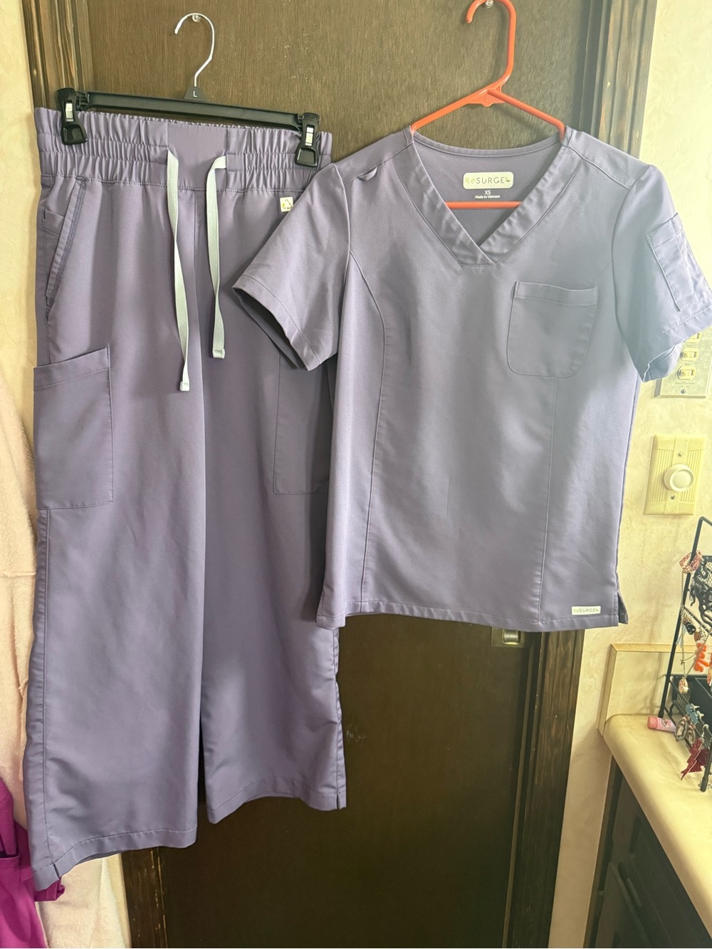 Resurge Women’s purple Scrub Top and Drawstring Pants Set